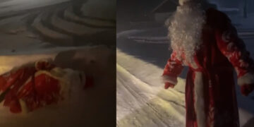 (Видео) Пијан Дедо Мраз заспа на -30 среде улица