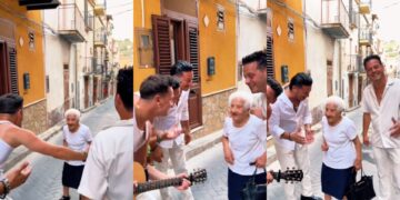 (Видео) Италијански музичари изненадија 85 годишна баба на улица која ги чувала од деца, па ѝ ја испејаа песната „Те сакам“