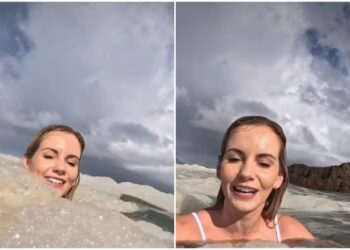 (ВИДЕО) Инфлуенсерка се капела во океан полн со пена, а потоа следуваше шок: „Се надевам дека знаеш што е тоа“